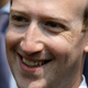 Facebook’s CEO Mark Zuckerberg smiles during a picture with guests attending the “Tech for Good” Summit at the Elysee Palace in Paris in May of 2018.